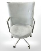 A Danish Erik Jorgensen designed Partner chrome framed executive swivel armchair in pale blue suede