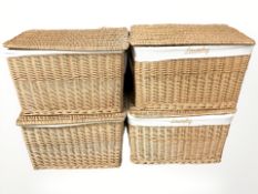 Four wicker hampers,