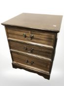 A reproduction three drawer chest, width 50 cm.