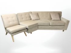 A 20th century corner settee and matching armchair.