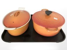 A Le Creuset enamelled cast iron twin-handled cooking pot and a French Cousances lidded tureen