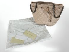 Stella McCartney : A pink vegan leather bucket bag with dust bag and two retail tags
