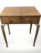 A 20th century burr walnut single drawer side table, width 64 cm.
