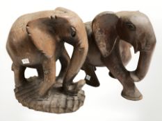 Two carved hardwood figures of elephants, height 20 cm.