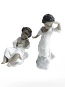 Two Lladro figures of boy angels, tallest 17 cm.