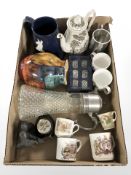 A Poole pottery vase, claret jug with EPNS mount, commemorative mugs, set of napkin rings,