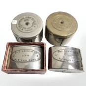 Four metal money savings banks.