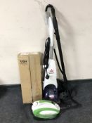 A Bissell floor cleaner, Vaporetto steamer,