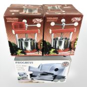 A Progress stainless steel electric slicer and two Tommy juicers.