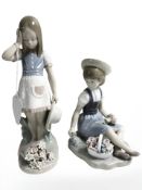 Two Lladro figures of girls picking flowers,