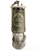 An Eccles Protector Type 6 miners safety lamp.