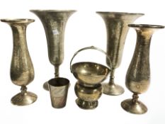 Six various Indian engraved brass vessels, tallest 22 cm.