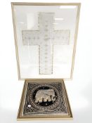 An Indian embroidered panel depicting an elephant and a further linen crucifix embroidery,