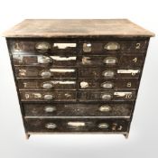 A Victorian pine twelve drawer plan chest, 95 cm x 61 cm x 94 cm.