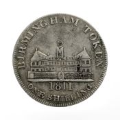 An 1811 one shilling Birmingham silver token.