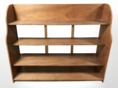 Two 20th century laminated ply open bookcases, largest 148 cm x 43 cm x 122 cm,