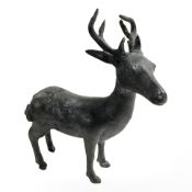 A cast bronze figure of a deer, height 14 cm.