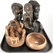 A group of African carved hardwood busts and similar items