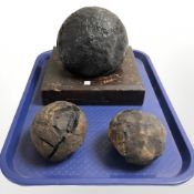 Three antique excavated cannon balls.