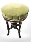 A Victorian rosewood circular stool, height 51 cm.