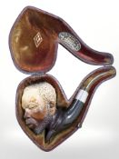 A 19th century Meerschaum pipe, the bowl in the from of a North-African man,