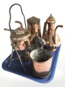 A 19th century copper and brass spirit kettle on stand, a further cast iron handled copper measure,