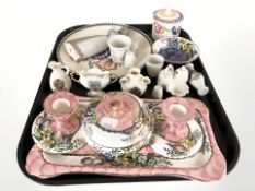 A Maling pink lustre tray, lidded box and pair of squat candlesticks, a group of crested china,