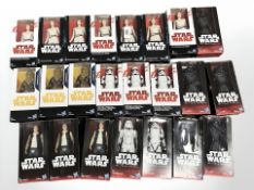 Twenty three Hasbro Disney Star Wars figurines, all boxed.