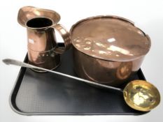 A 19th century copper cooking pot,