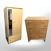 A 20th century Schreiber teak wardrobe, width 74 cm, together with a four drawer chest.
