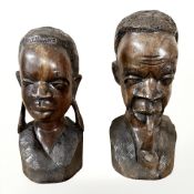 A pair of African carved hardwood busts, tallest 25 cm.