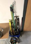 A quantity of garden tools and a spirit level etc