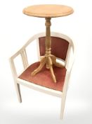 A blond oak occasional table and an armchair