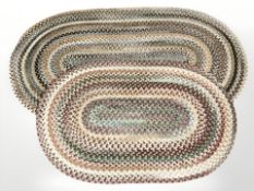 Two contemporary oval wool mats,