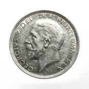A 1927 George V half crown mint.