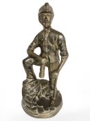 A brass figure of a miner, height 28 cm.
