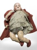 An antique German bisque-headed jointed doll, the head stamped Haubach Koppelsdorf 300 7,