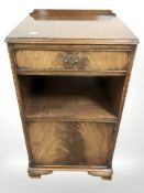 A mahogany bedside stand, fitted a drawer, width 42 cm.