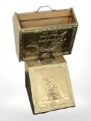 An embossed brass coal receiver and a similar magazine rack.