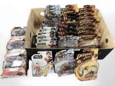 Thirty one Marvel figurines, including Indiana Jones, Thor, Star Wars and Iron Man, all boxed.