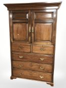 A Victorian and later mahogany linen press, 133 cm x 62 cm x 204 cm.