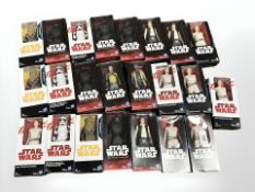 Twenty three Hasbro Disney Star Wars figurines, all boxed.