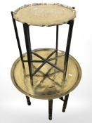 An Eastern bobbin turned brass topped table with Islamic script, diameter 59 cm,
