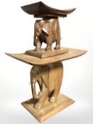 Two wooden elephant stools, largest 46 cm wide.