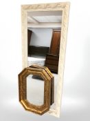 A reproduction octagonal gilt mirror and a further cream mirror, largest 133 cm x 57 cm.