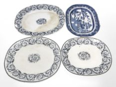 Three 19th century graduated meat plates, plus a further willow pattern example, largest 48 cm.