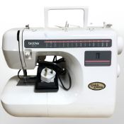 A Brother PS-31 electric sewing machine with lead and pedal.
