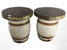 Two 19th century earthenware kegs, marked rum and gin, with later wooden tops, height 35 cm.