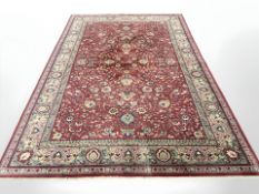 A machine-made carpet of Persian design,