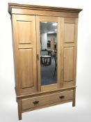 An Edwardian satin walnut mirror door wardrobe,